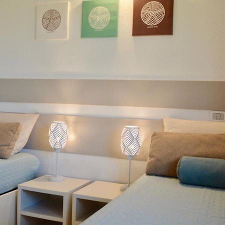 Case Sul Mare Residenze Di Bes Chia Bagian luar foto