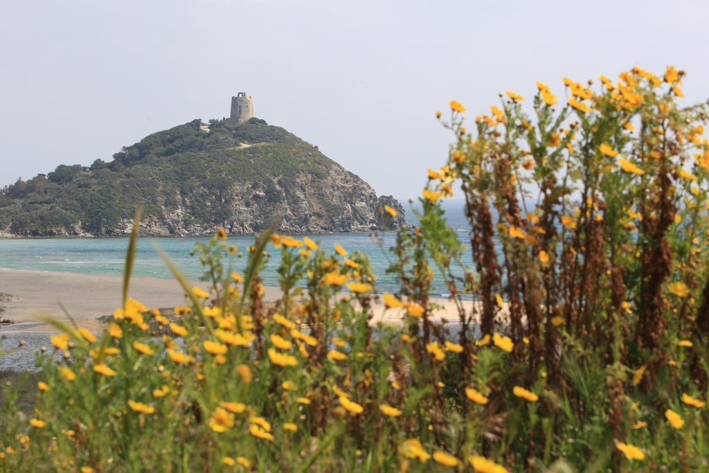 Case Sul Mare Residenze Di Bes Chia Bagian luar foto