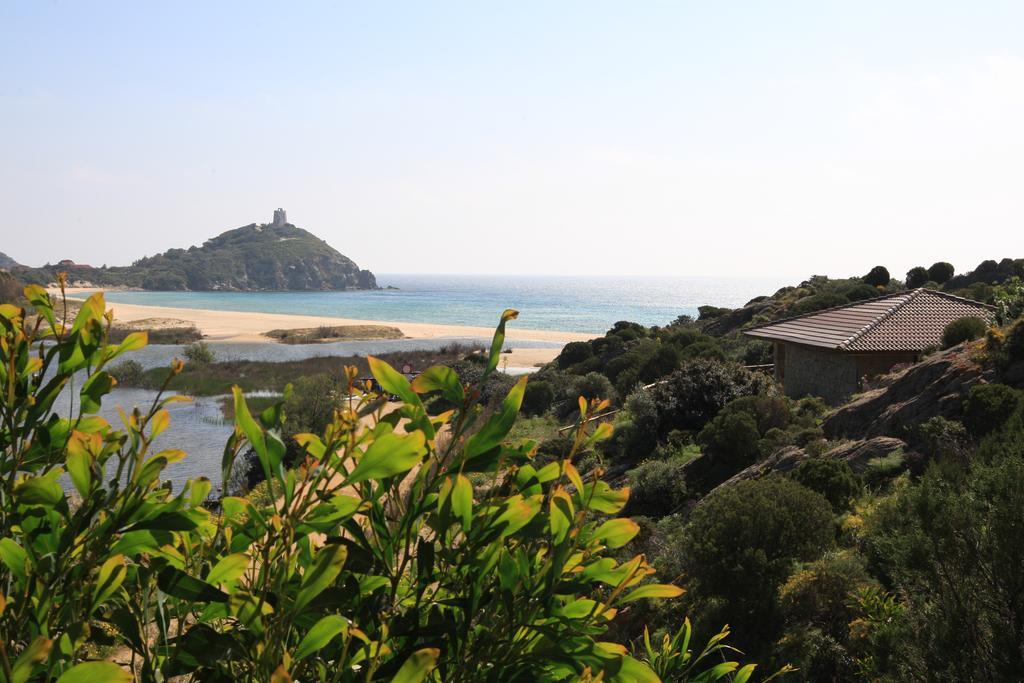 Case Sul Mare Residenze Di Bes Chia Bagian luar foto