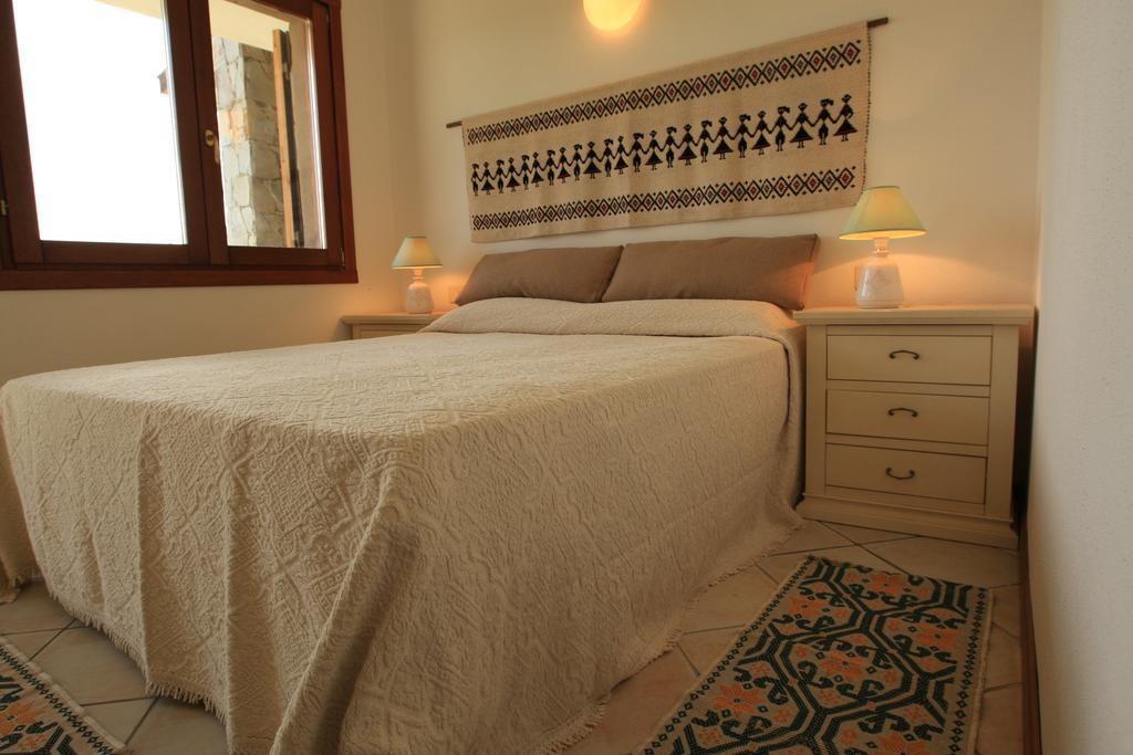 Case Sul Mare Residenze Di Bes Chia Bagian luar foto