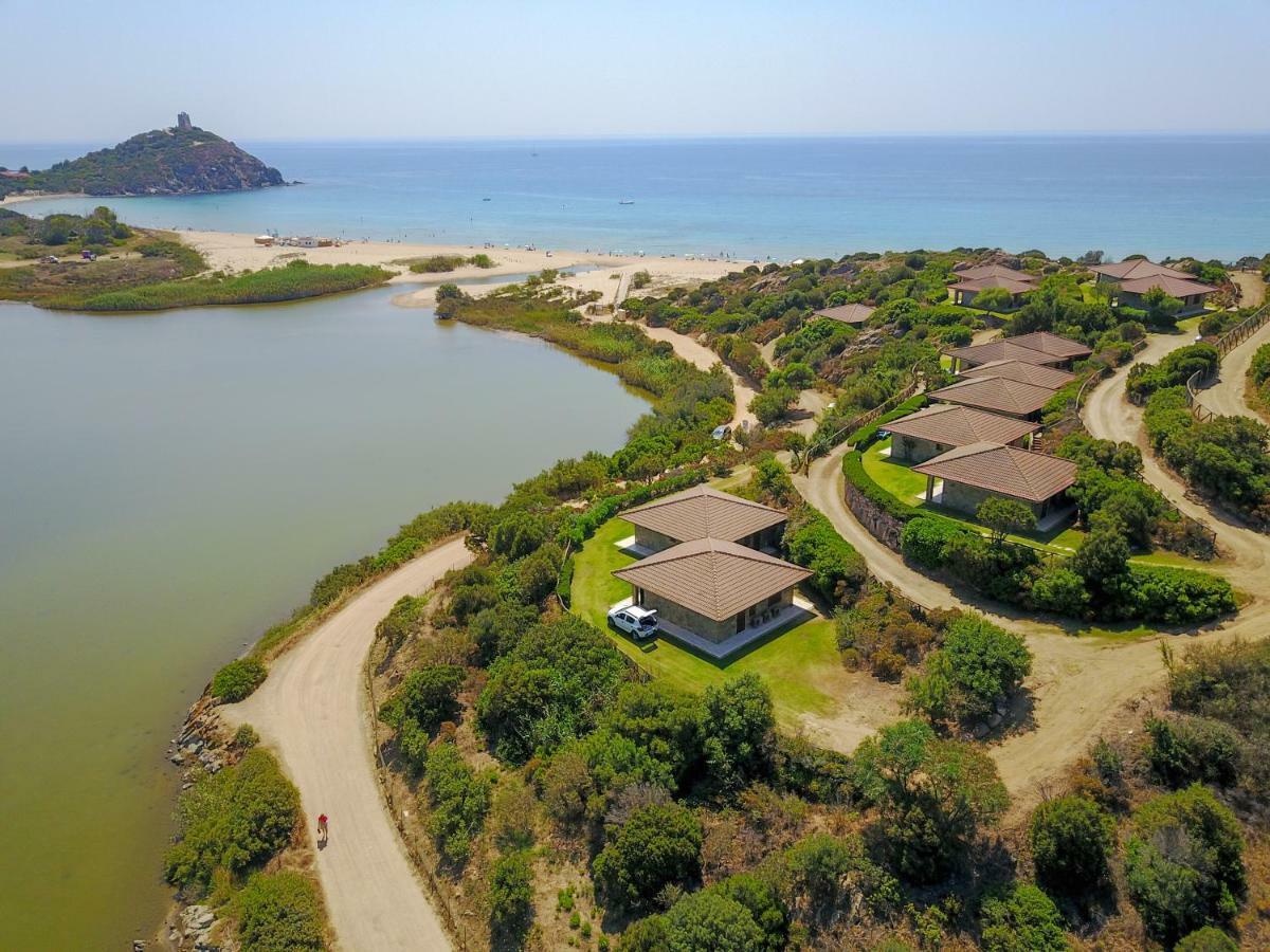 Case Sul Mare Residenze Di Bes Chia Bagian luar foto